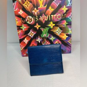 LOUIS VUITTON EPI ELISE
WALLET MYRTILLE